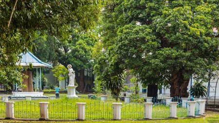 Central garden in the colorful blue Palace of the sultan in Surakarta, Java, Indonesiaのeditorial素材