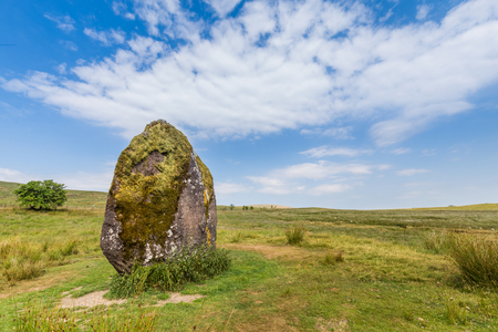 Typical landscape of Brecon Beacons National Park with ancient standing stone called Maen Llia from the Bronze age. In Powys, Wales, UKの写真素材