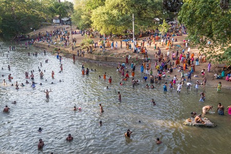 Bandarawela  Sri Lanka August 02 2017 -  Many hindu people bathing in the river  Menik Ganga at the start of a celebration in the Ruhunu Maha Kataragama Devalaya temple in  Sri Lankaのeditorial素材
