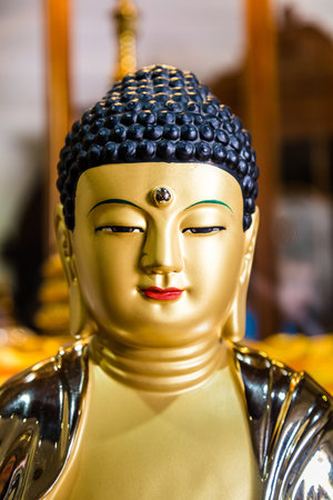 Kandy  Sri Lanka July 29 2017 -Buddha statue as part of the interior of the Temple of the Tooth Relic on he first floor of the temple in Kandy, Sri Lankaのeditorial素材