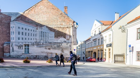 Tartu, Estonia - September 27, 2018: Historic image of the university building of Tartu Ulikool painted on a wall  in the streets of  historical  centre of  Tartu in Estoniaのeditorial素材