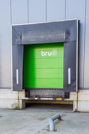 Green loading ramp doors for loading trruck at a distribution centerの写真素材