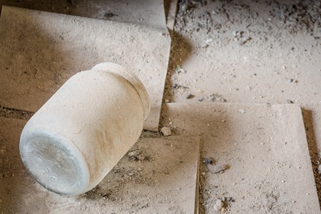 Old jar covered with dust in Belarus, Chernobyl exclusion zoneの写真素材