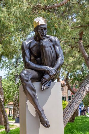 Venice Italy - May 25, 2019:  Biennale Arte 2019 Sculpture of a male swimmer by Carole Feuerman in Giardini della Marinaressaのeditorial素材