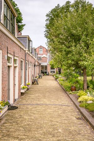 Haarlem, The Netherlands - May 31, 2019: Lutherse Almshouse (hofje) originally providing housing for poor members of the church.のeditorial素材