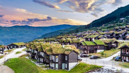 Myrkdalen, Hordaland, Norway, Scandinavia - July 28, 2019: Typical traditional Norwegian houses with natural green roofs in Myrkdalen in Norwayのeditorial素材