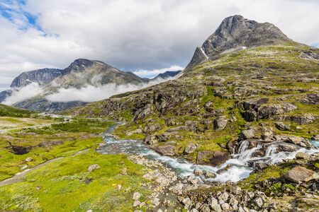 Norwegian landscape with Trollstigen center in the background, National scenic route Geiranger Trollstigen More og Romsdal county in Norwayの写真素材