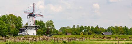 Windmill De Vlinder along estate Heerlijkheid Marienwaerdt in he Betuwe near Beesd, Gelderland The...