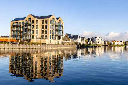 Harderwijk , The Netherlands - November 13, 2021: Urban area Water front with modern houses in city Hardewijk, Gelderland in The Netherlandsのeditorial素材