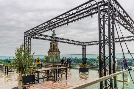 Groningen, The Netherlands - August 19: People enjoying the view from the roof terrace of Forum...