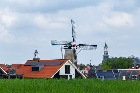Panorama with windmill of touristic traditional villlage Ootmarsum in Twente, Overijssel in The Netherlandsの写真素材