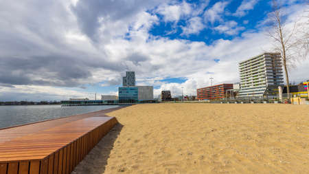 Almere, The Netherlands - April 3, 2022: Pier and beach Esplanada Ferry to Floriade Expo 2022 in Almere Amsterdam The Netherlands. Floriade area in the backgroundのeditorial素材