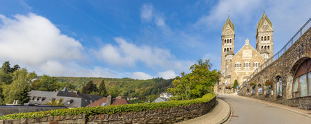 Clervaux, Luxembourg - October 3, 2022: Cityscape with roman catolic church Saints-Come-Et-Damien of Clervaux in Luxembourgのeditorial素材