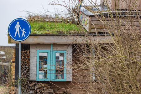 Olst Wijhe, The Netherlands - January 21, 2023: Library box at Self-build earth houses a sustainable circular and nature inclusive neighbourhood in Olst Wijhe in Overijssel The Netherlandsのeditorial素材