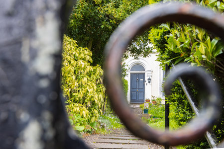 Ornamental front yards surrounded by walls along Lee river in Cork Munster province in Ireland Europeの写真素材