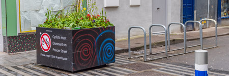 Cork, Ireland - April 16, 2023: Cityscape with flower pots in the center of Cork in Munster province in Ireland Europeのeditorial素材