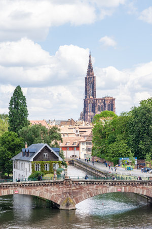 Strasbourg, France - May 14, 2023: Barrage Vauban scenic view with Notre Dame cathedral in Strasbourg in Elsace region along the Rhine river in Franceのeditorial素材