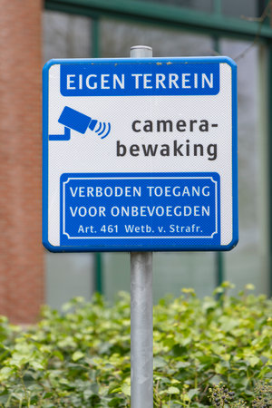 Ede, The Netherlands - February 11, 2024: Dutch sign Private property Camera surveillance. Authorized access only.のeditorial素材