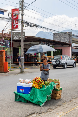 Tilaran, Costa Rica - March, 9 2024: Fruit street seller in La Fortuna in Alajuela region in Costa Rica Central Americaのeditorial素材