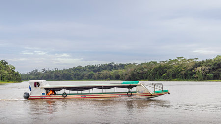 Rio San Juan, Nicaragua - March 12, 2024: Transport by boat along the San Juan river and Biosphere reserve along the border of Nicaragua and Costa Ricaのeditorial素材