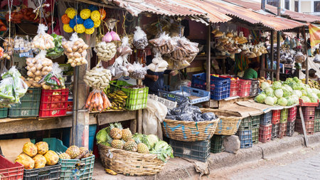 Juilgalpa, Nicaragua - March 12, 2024: Street view with market stall with all kinds of food in the...