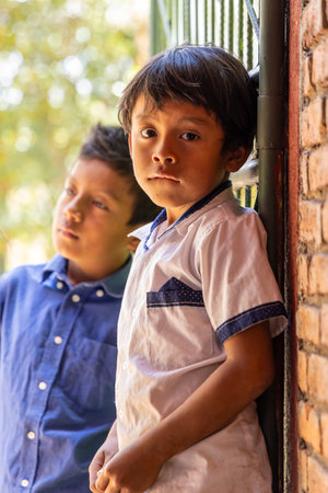 El Chile, Nicaragua - March 13, 2024: Children at Workstation and shop of Nicaraguan indigenous artisan weavers that live and work in the mountains of Northern Nicaragua.のeditorial素材