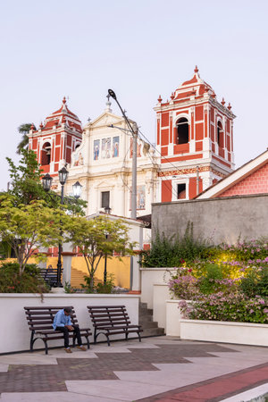 Leon, Nicaragua - March 17, 2024: Public park park El Calvario with statue of Antonio Valdivieso in front of Calvary church (Sweet name of Jesus) in Leon in Nicaraguaのeditorial素材