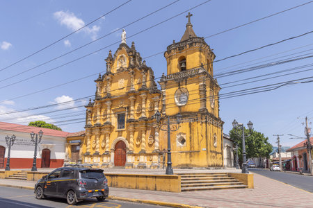 Leon, Nicaragua - March 17, 2024: Front view of yellow chuch of the Recollection of Leon in Nicaraguaのeditorial素材