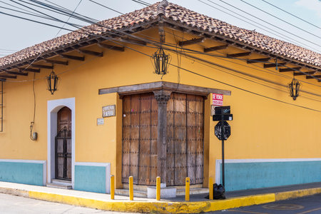 Leon, Nicaragua - March 17, 2024: Cityscape with colorful colonial building in city Leon in Nicaraguaの写真素材
