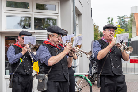Barneveld, The Netherlands - August 1, 2024: Traditional brass band at Veluwe market with all kinds of handcrafts in Barneveld Gelderland province in The Netherlandsのeditorial素材