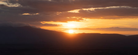 Panoramic sunset view with sunbeams of Lake Manyara in Tanzania East Africa