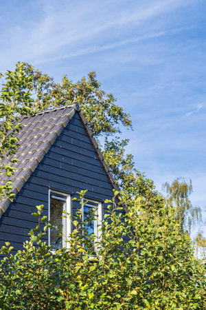 Tiny cottage in natural green autumn environment in Drenthe provinced in the Netherlands