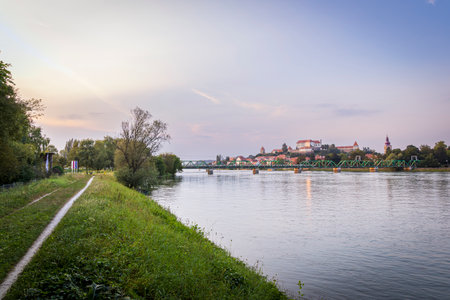 Skyline of Ptuj along Drava river and Lake Ptujsko Jezero near Ptuj in Styria region in Slovenia at sunsetの写真素材