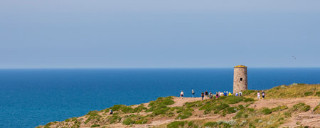 Panoramic view of Cap Frehel with lighthouse at the emerald coast of Brittany France