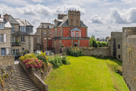 Cityscape with city wall surrounding the old town of Dinan in Cotes-dArmor, Brittany, Franceの写真素材