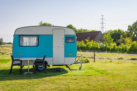 Little Retro caravan parkerd at lawnの写真素材