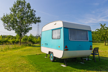 Little Retro caravan parkerd at lawnの写真素材