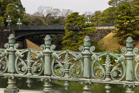 Ornamented copper bridge at Fukiage Omiya Palace in Kokyo park in Japanの写真素材