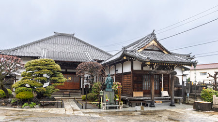 Scenic view of a temple in Yanaka subsurb in Tokyo, Japan. Yanaka is an atmospheric, traditional part of Tokyo known for its nostalgic atmosphere, temples and cats.の写真素材