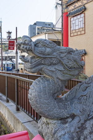 Nagasaki, Japan - March 22, 2025: Dragon sculpture at bridge entering Shinshi Chinatown in Nagasaki in Japanのeditorial素材