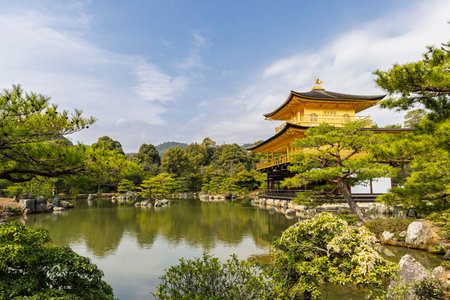 Scenic view of Kinkakuji Temple (The Golden Pavilion) reflected in pond in Kyoto, Japanの写真素材