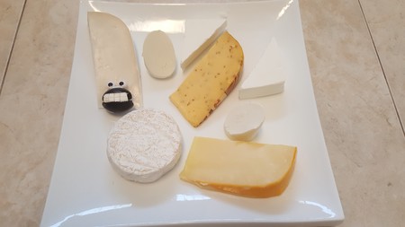 cheese art decor smile olive plateの写真素材