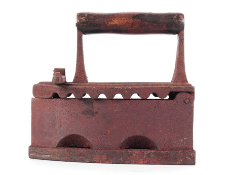 The old clothes charcoal iron on a white background.の写真素材