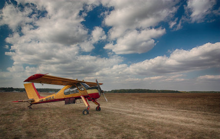 The old plane against the cloudy skyのeditorial素材