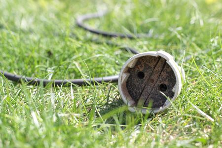 The old socket the extender in a grass.の写真素材