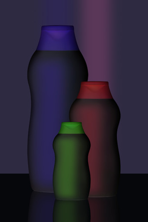 Composition from three empty bottles with reflection against a dark background.の写真素材