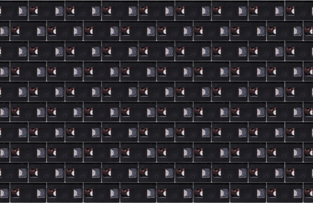 Wall from bricks in the form of VHS videotapesの写真素材