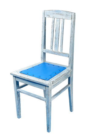 The old chair upholstered with nails blue leatherette on a white background. Isolatedの写真素材