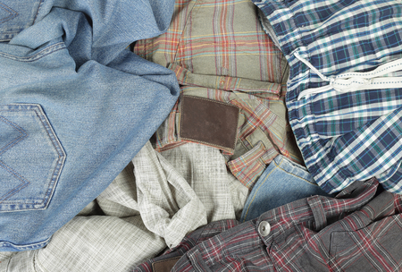 Clothes accessories - Top view heap dirty colorful jeans background