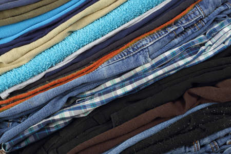 Clothes and accessories - diagonal closeup group stack pile clotes backgroundの写真素材